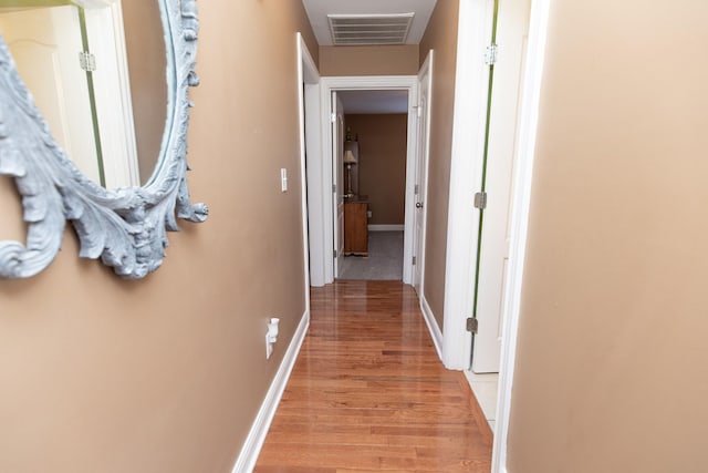 hall featuring light hardwood / wood-style floors