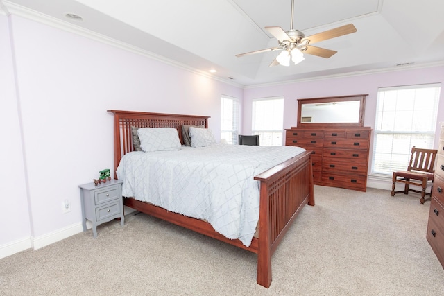 carpeted bedroom with ceiling fan and crown molding