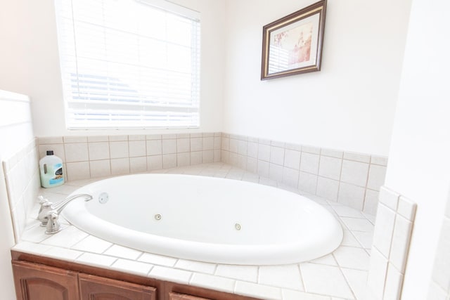 bathroom featuring a bathing tub and a healthy amount of sunlight