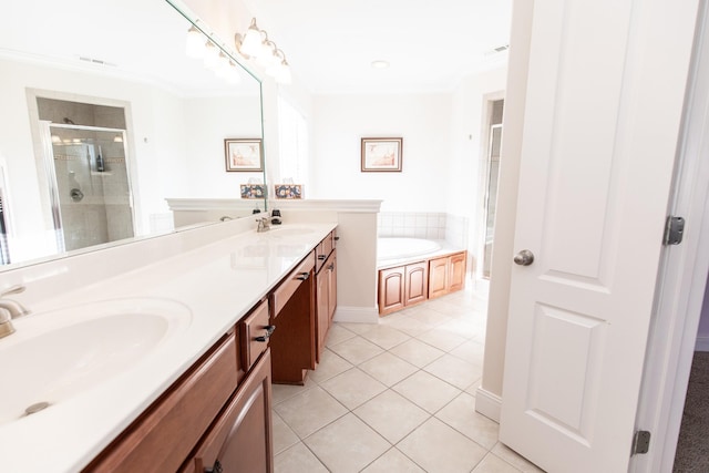 bathroom featuring crown molding, tile patterned flooring, vanity, and shower with separate bathtub