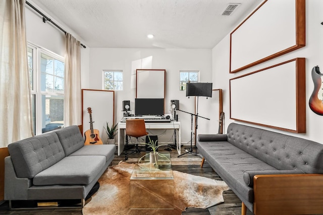 office space with wood-type flooring