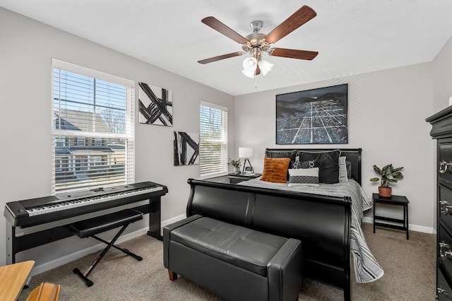 bedroom featuring ceiling fan and carpet floors