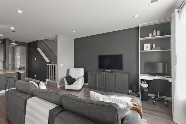 living room featuring dark hardwood / wood-style flooring