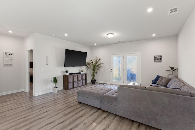 living room featuring light wood-type flooring