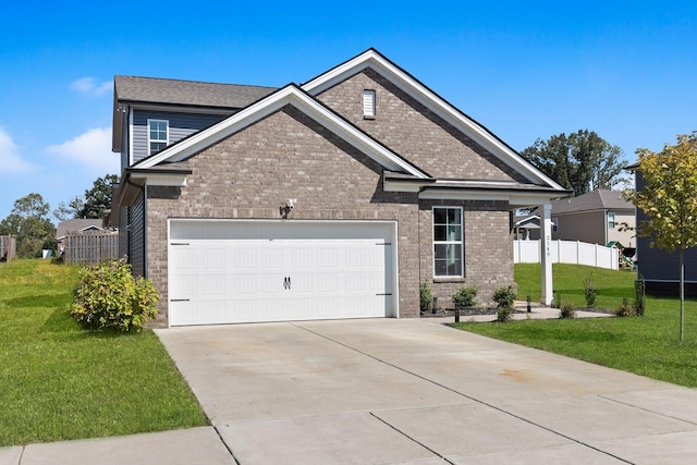 craftsman-style house featuring a front yard