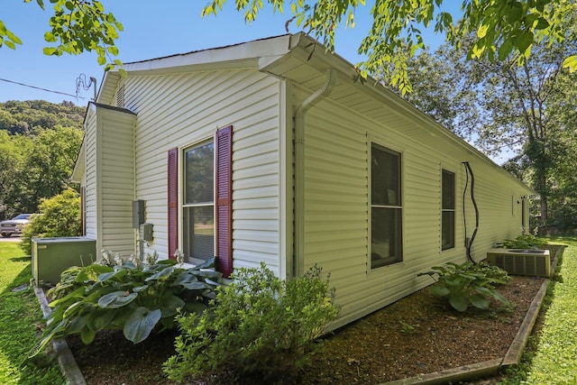 view of home's exterior featuring cooling unit