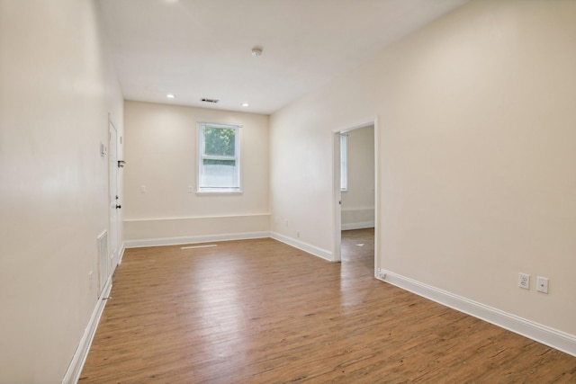 spare room with light wood-type flooring