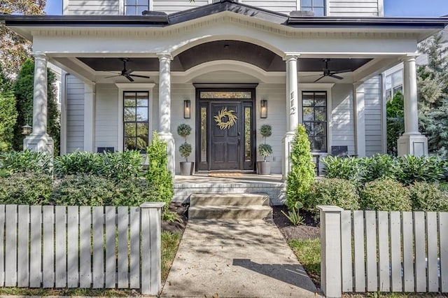 doorway to property with ceiling fan