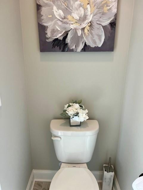 bathroom featuring toilet