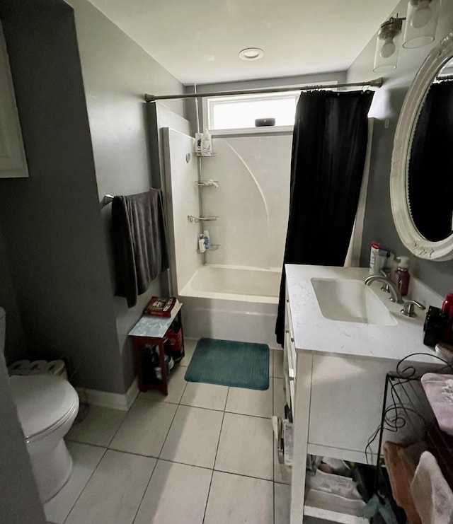 full bathroom featuring tile patterned flooring, vanity, shower / tub combo with curtain, and toilet