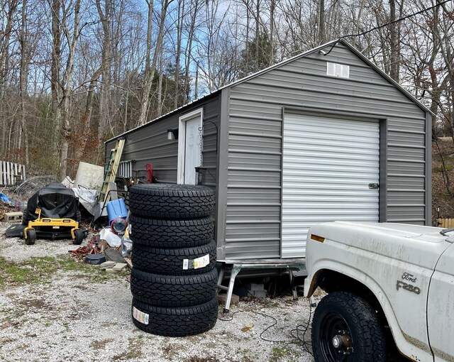 view of outbuilding featuring a garage