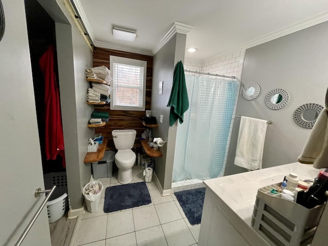 bathroom with tile patterned flooring, a shower with shower curtain, crown molding, and toilet