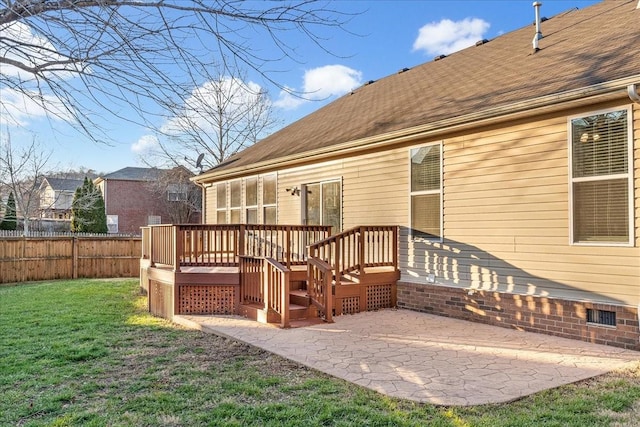 rear view of property featuring a yard and a patio area