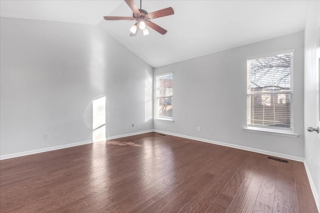 unfurnished room with ceiling fan, dark hardwood / wood-style floors, and vaulted ceiling