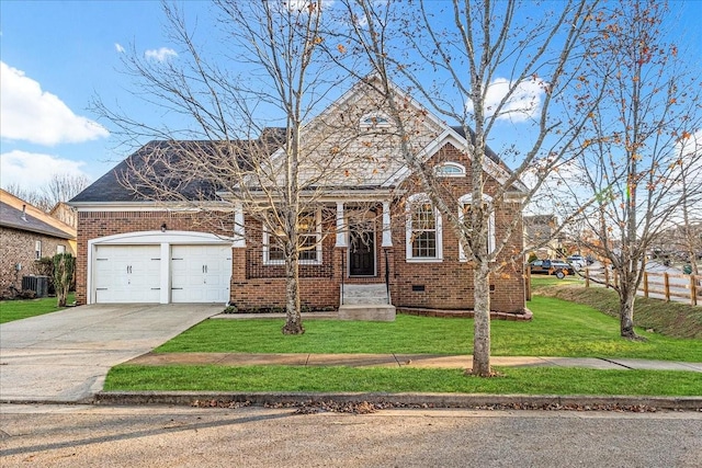 view of front facade featuring a front yard and a garage