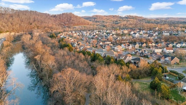 bird's eye view with a water and mountain view