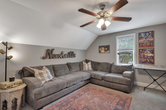 carpeted living room with ceiling fan and lofted ceiling