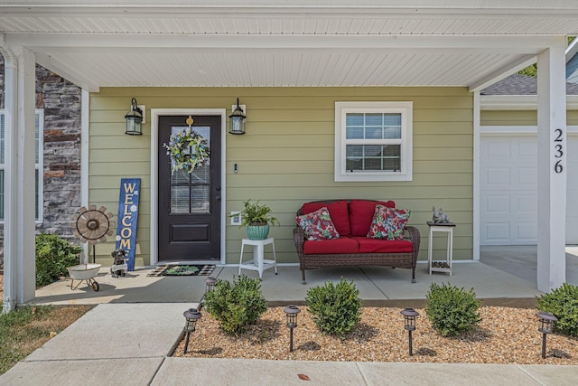 entrance to property with covered porch