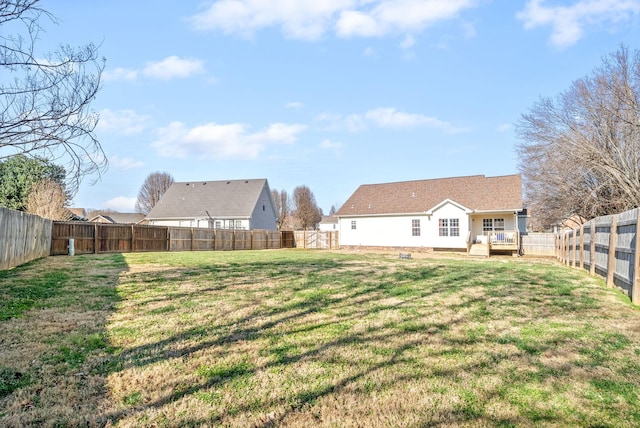 view of yard with a wooden deck