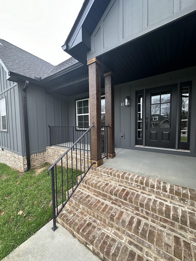 entrance to property with covered porch