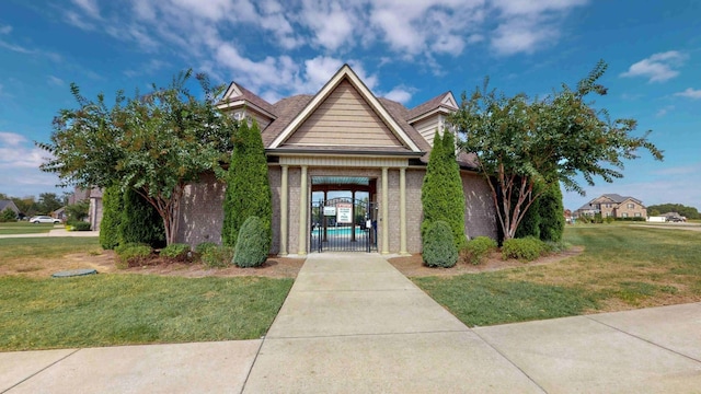 view of front of home with a front lawn