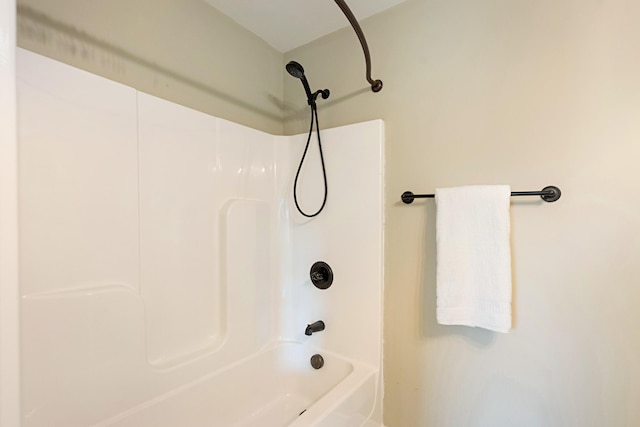 bathroom with shower / tub combination