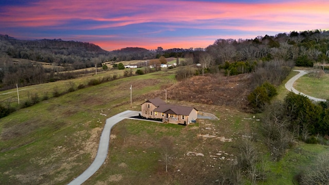 aerial view at dusk with a mountain view