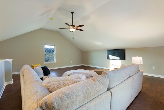 living room featuring ceiling fan, dark wood-type flooring, and vaulted ceiling