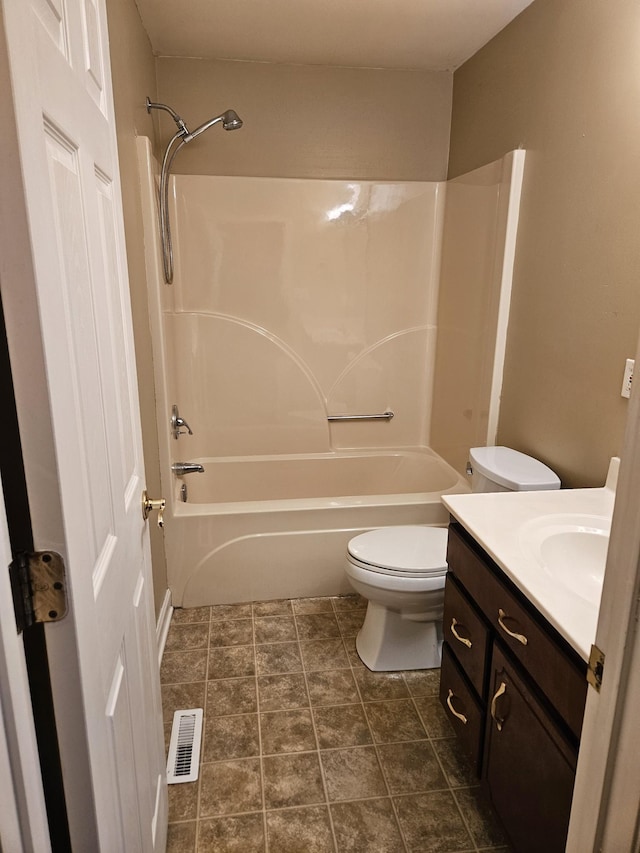 full bathroom with washtub / shower combination, vanity, and toilet