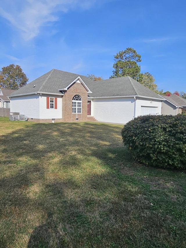 ranch-style home with a front lawn