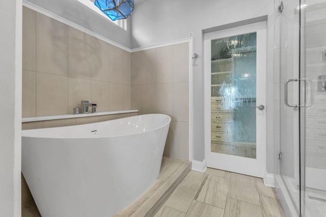 bathroom with plus walk in shower and tile patterned floors