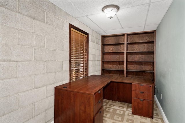 office space featuring a paneled ceiling