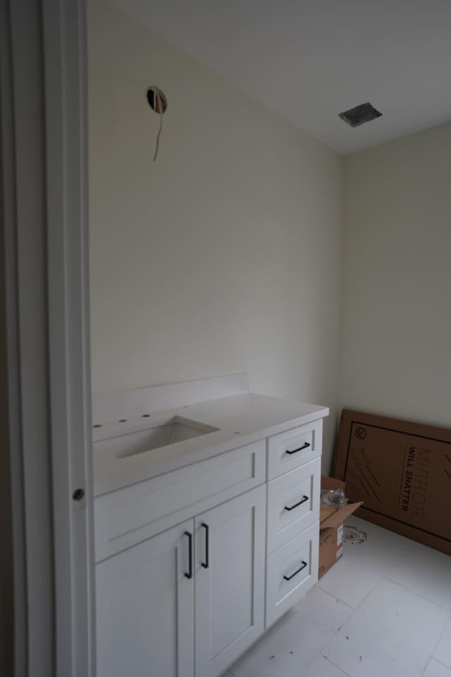 bathroom featuring vanity and tile patterned floors