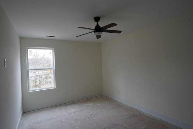 unfurnished room with ceiling fan