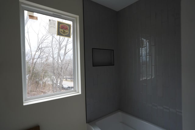 bathroom with a washtub