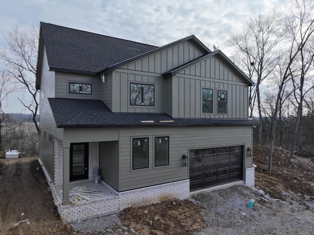 view of front of home with a garage