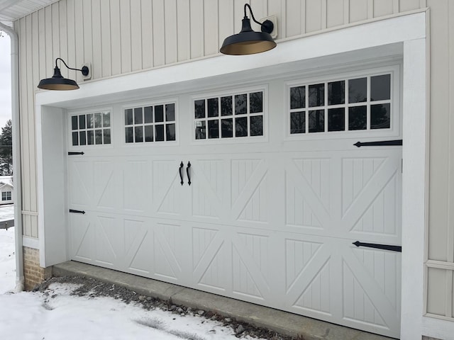 view of snow covered garage