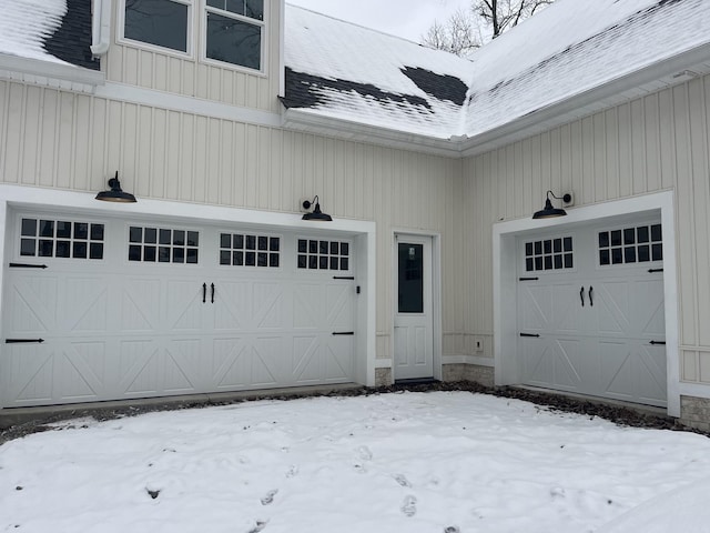 view of snow covered garage