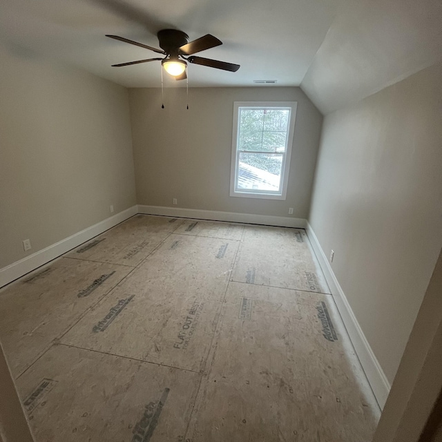 additional living space with ceiling fan and lofted ceiling