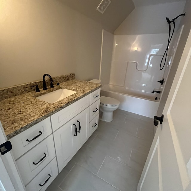 full bathroom featuring toilet, shower / bath combination, tile patterned floors, and vanity