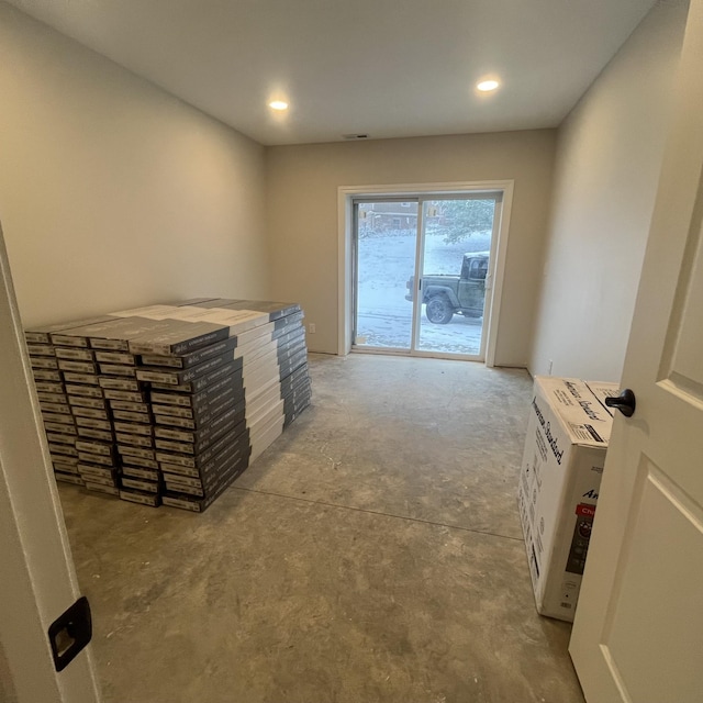 interior space featuring concrete floors