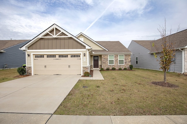 craftsman-style home with a garage and a front lawn