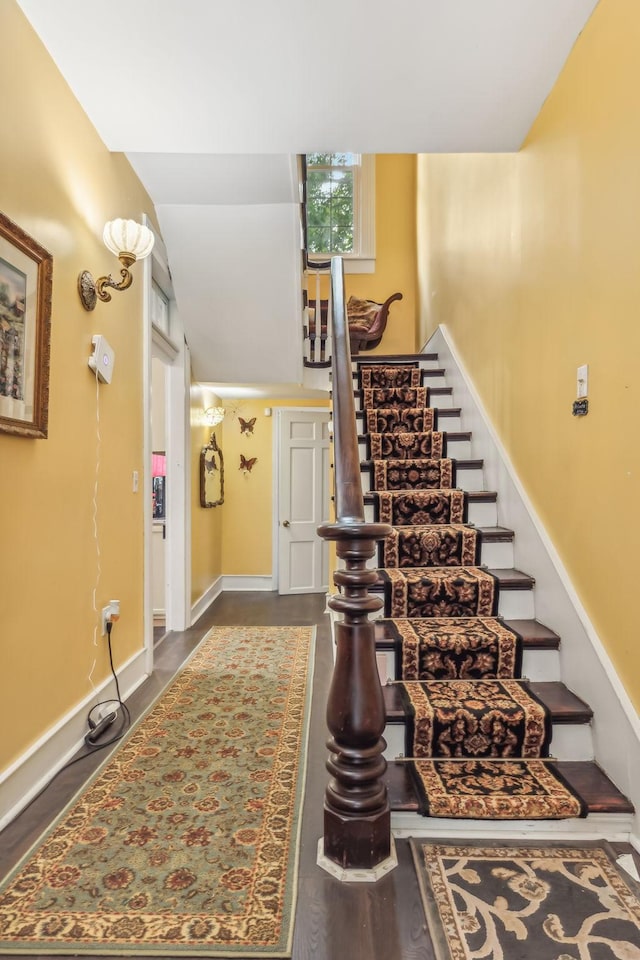 stairway with wood-type flooring