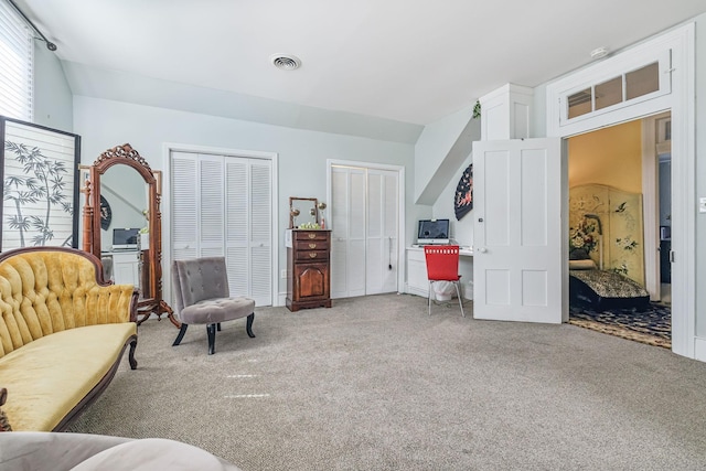 sitting room with carpet flooring