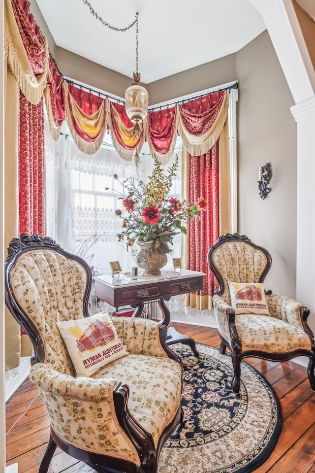 sitting room with hardwood / wood-style floors