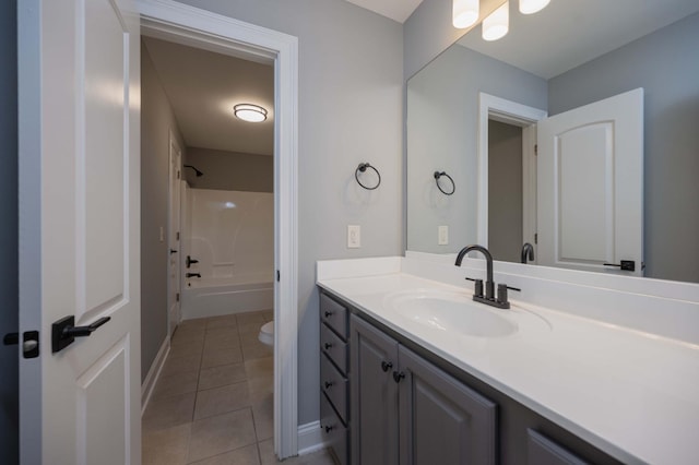 full bathroom with tile patterned flooring, vanity, toilet, and shower / bathtub combination