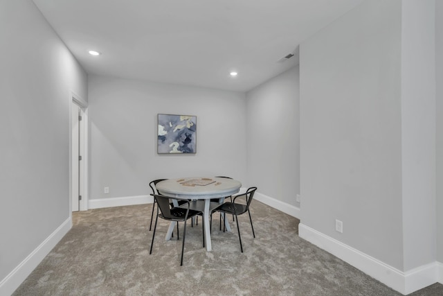 view of carpeted dining room