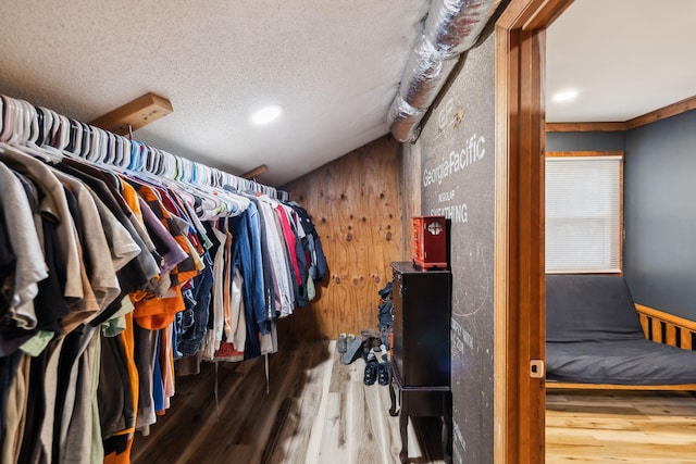 spacious closet featuring hardwood / wood-style flooring