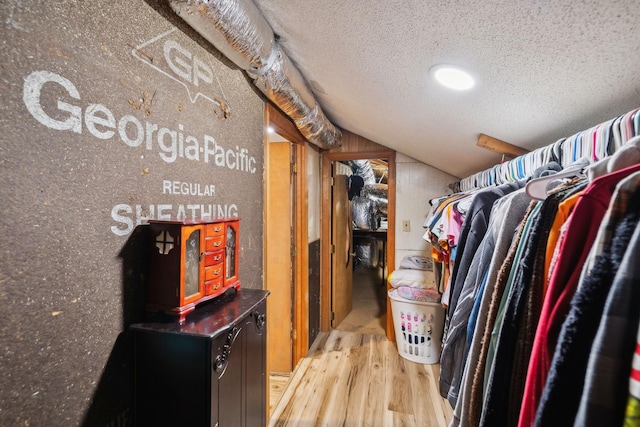 walk in closet featuring light hardwood / wood-style floors