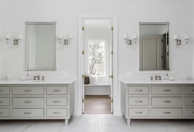 bathroom featuring tile patterned floors, tasteful backsplash, and vanity